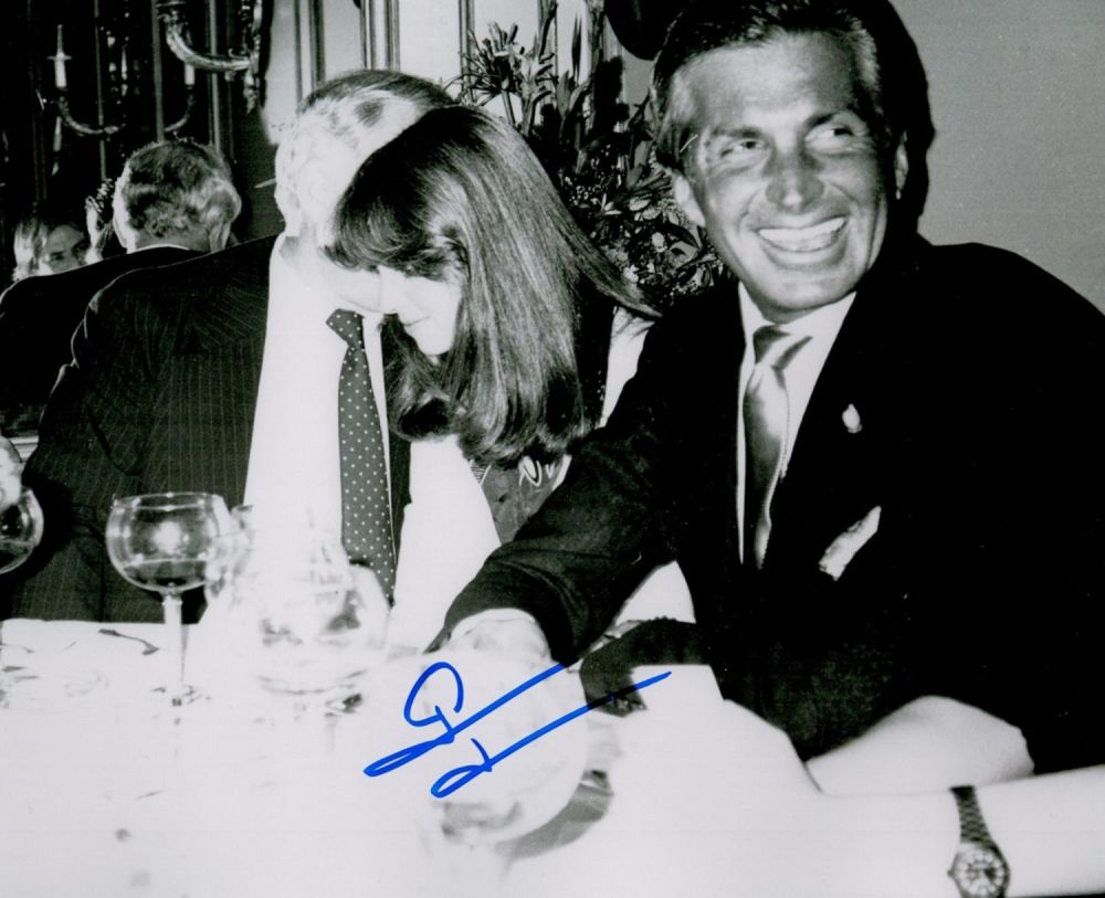 Lot 684: George Hamilton signed 10x8 black and white photo....