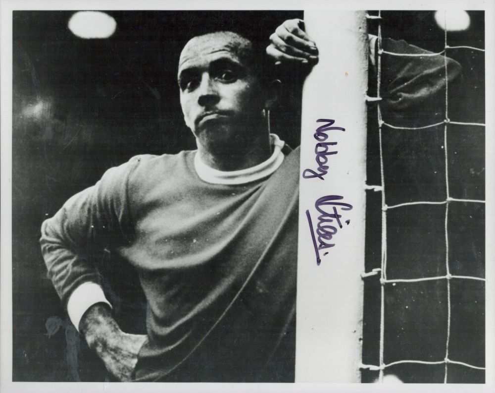 Lot 55: Nobby Stiles signed 10x8 black and white photo....
