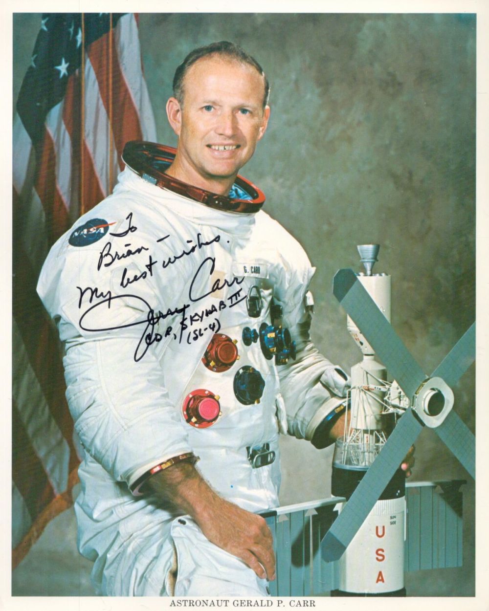 Lot 76: Gerald P Carr Astronaut Signed Colour Photo approx...