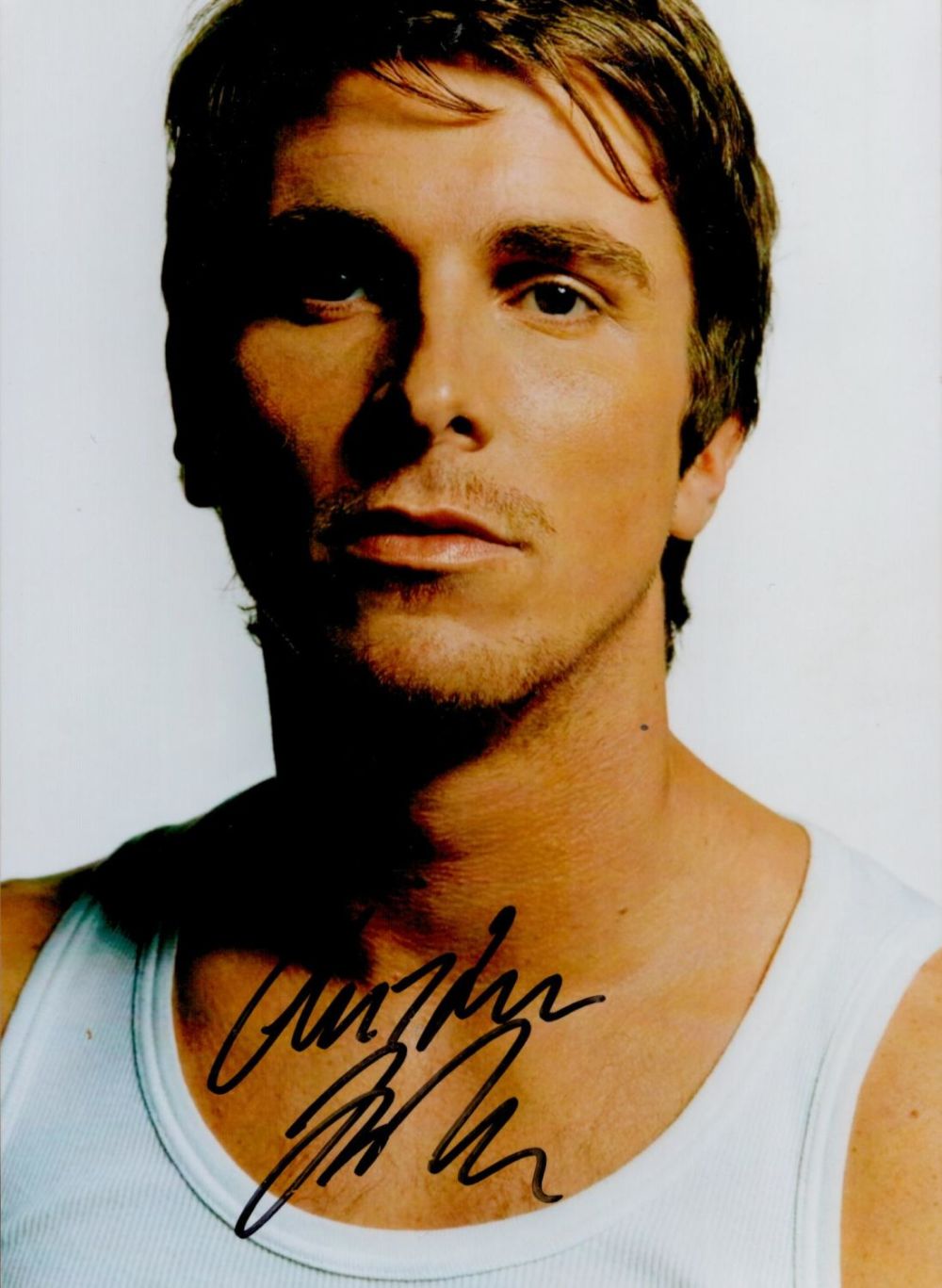 Lot 226: Christian Bale, a signed 7x5 photo. An English...