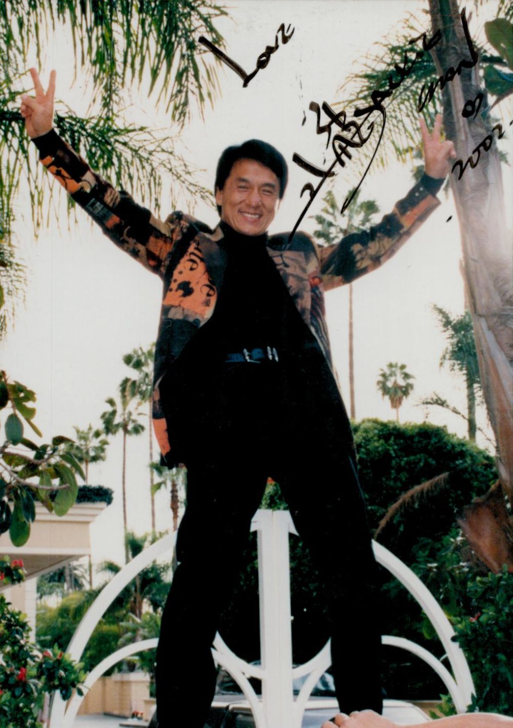 Lot 229: Jackie Chan, a signed 5x3. 5 photo, dated...