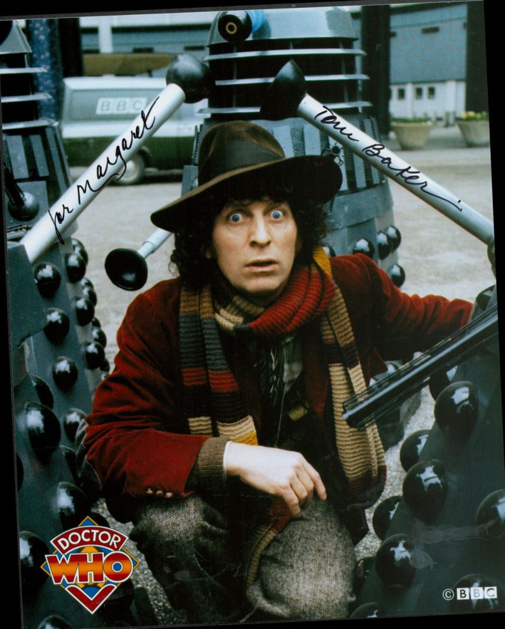 Lot 476: Tom Baker signed 10x8 Doctor Who colour photo....