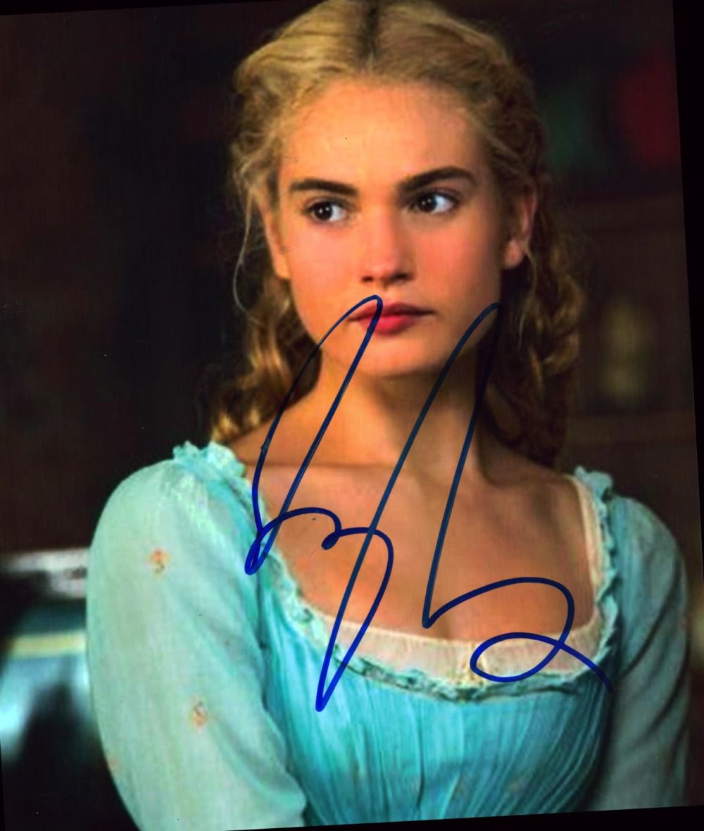 Lot 57: Lily James signed 10x8 Cinderella colour photo. Lily...