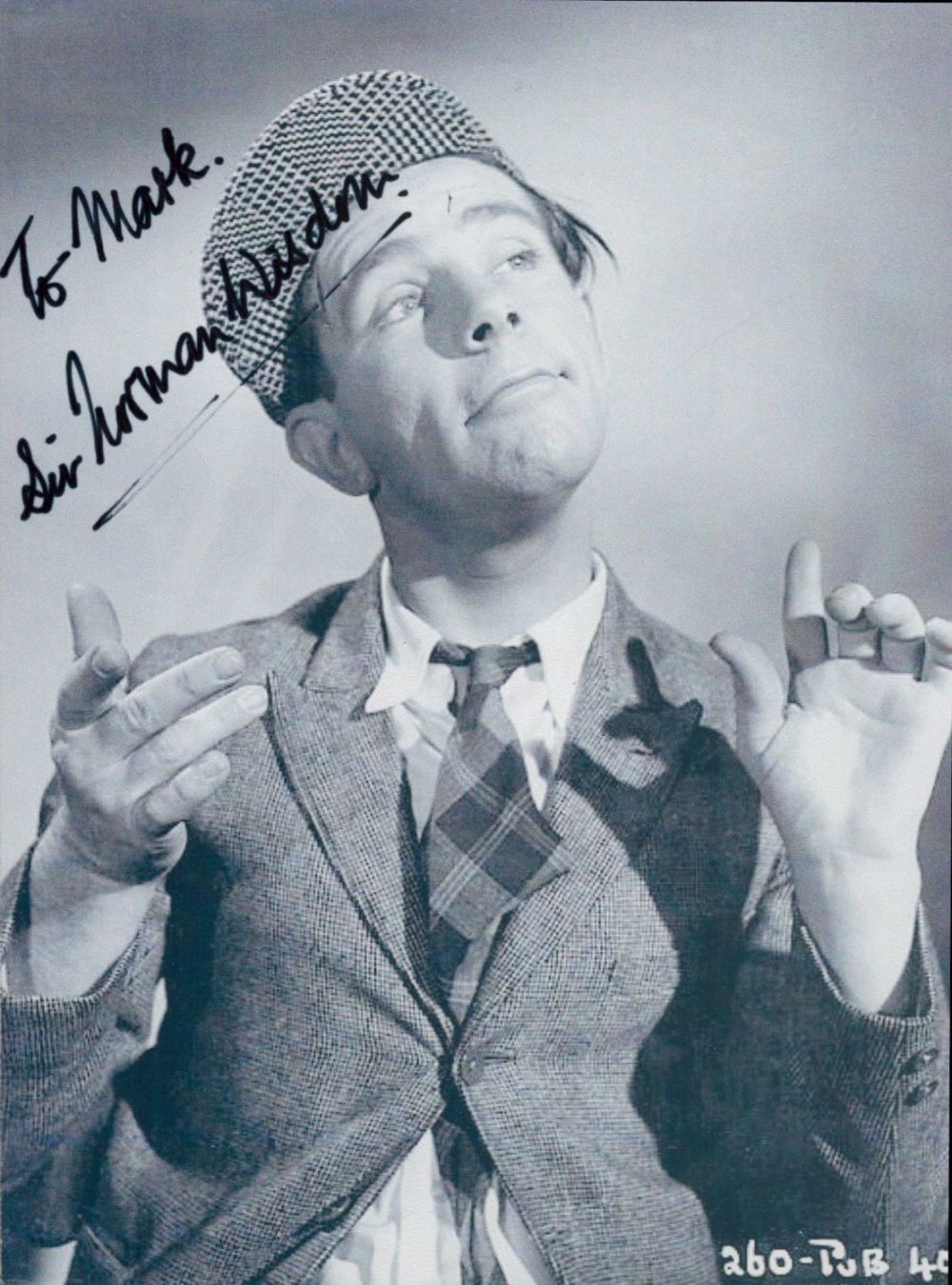 Lot 235: Sir Norman Wisdom Signed Black and White photo...