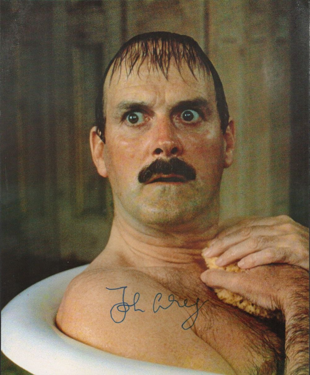Lot 432: Clockwise, a 10x8 film photo, signed by John...