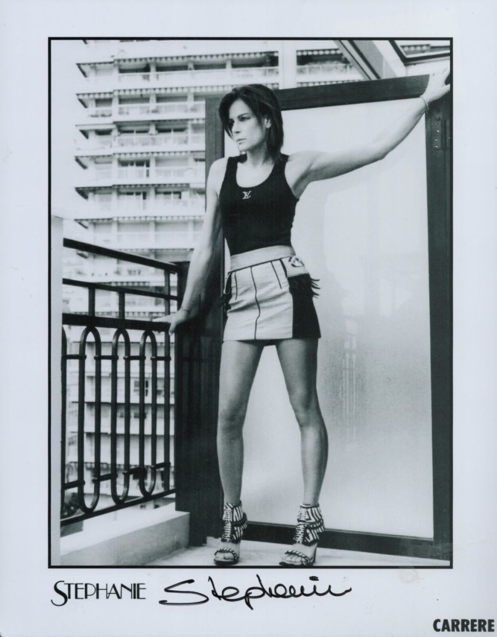 Lot 517: Stephanie signed 10x8 inch black and white photo....