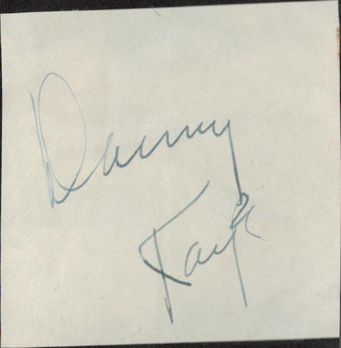 Lot 707: Danny Kaye small, clipped signature piece. Good condition....