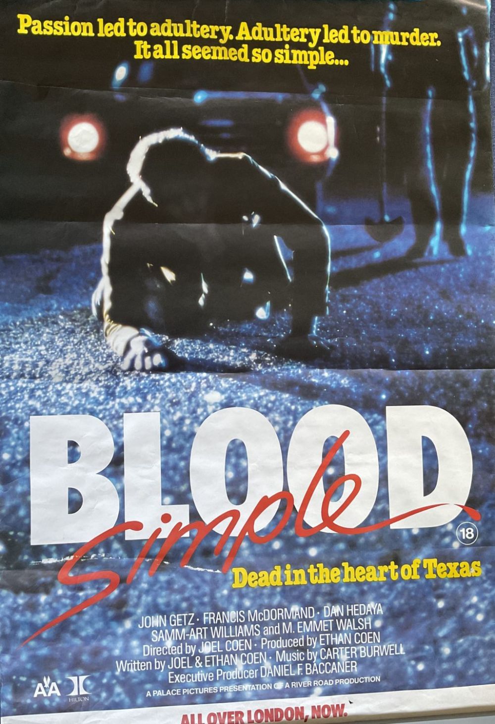Lot 182: Blood Simple movie poster. ROLLED. Small wear and...