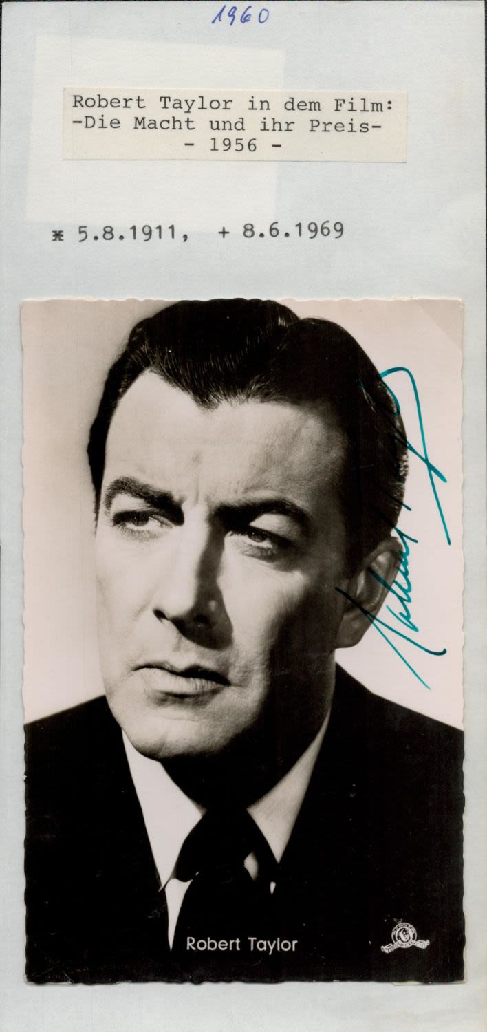 Lot 402: Robert Taylor signed 6x4IN black and white photo....