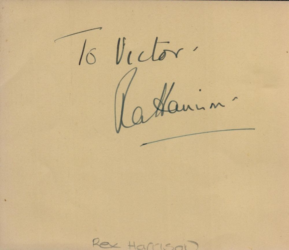 Lot 630: Rex Harrison signed album page. Dedicated. Good condition....