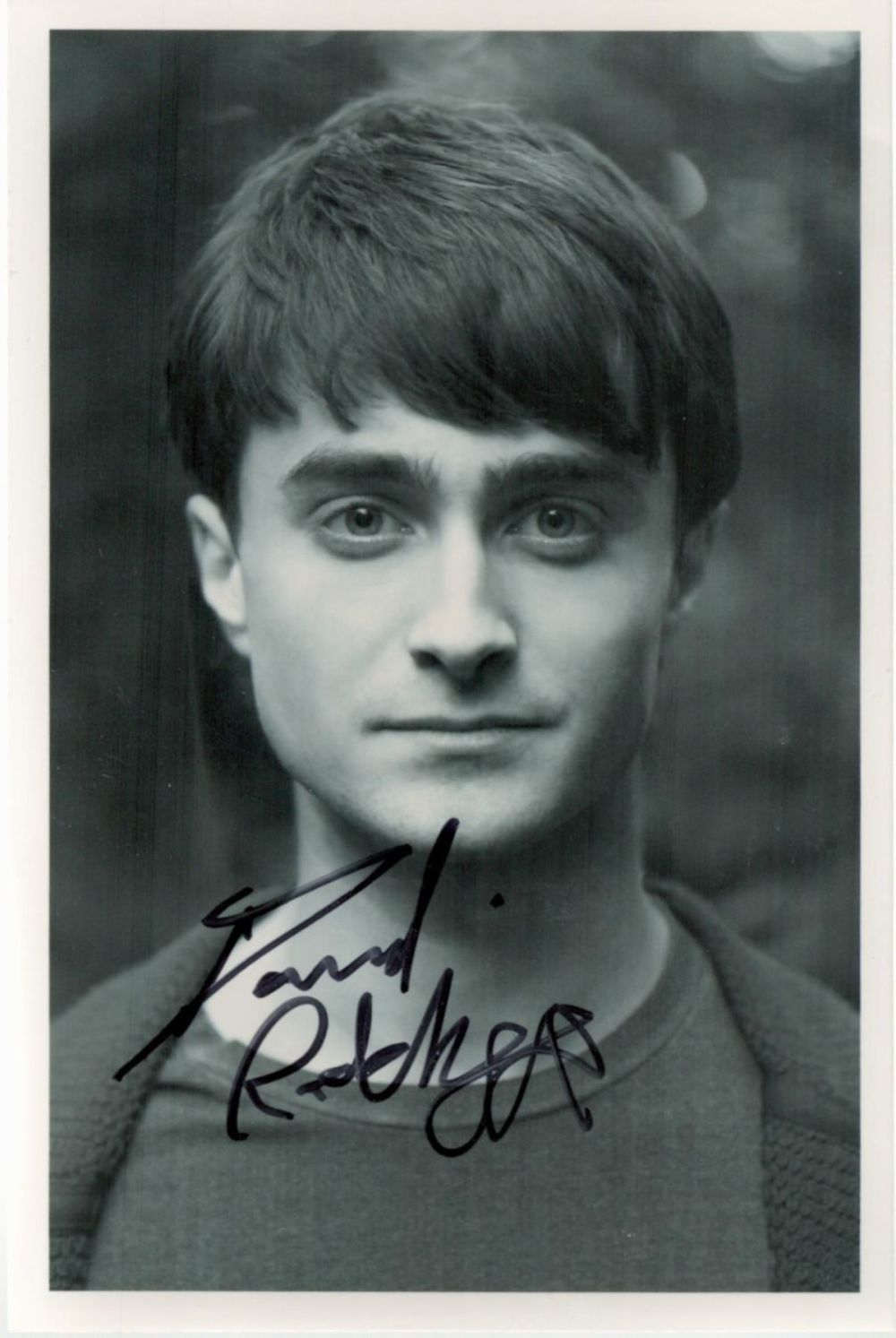 Lot 647: Daniel Radcliffe signed 7x5inch black and white photo....