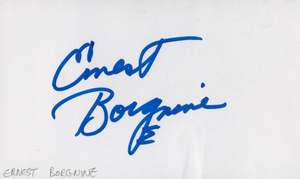 Lot 662: Ernest Borgnine signed album page. Good condition. All...
