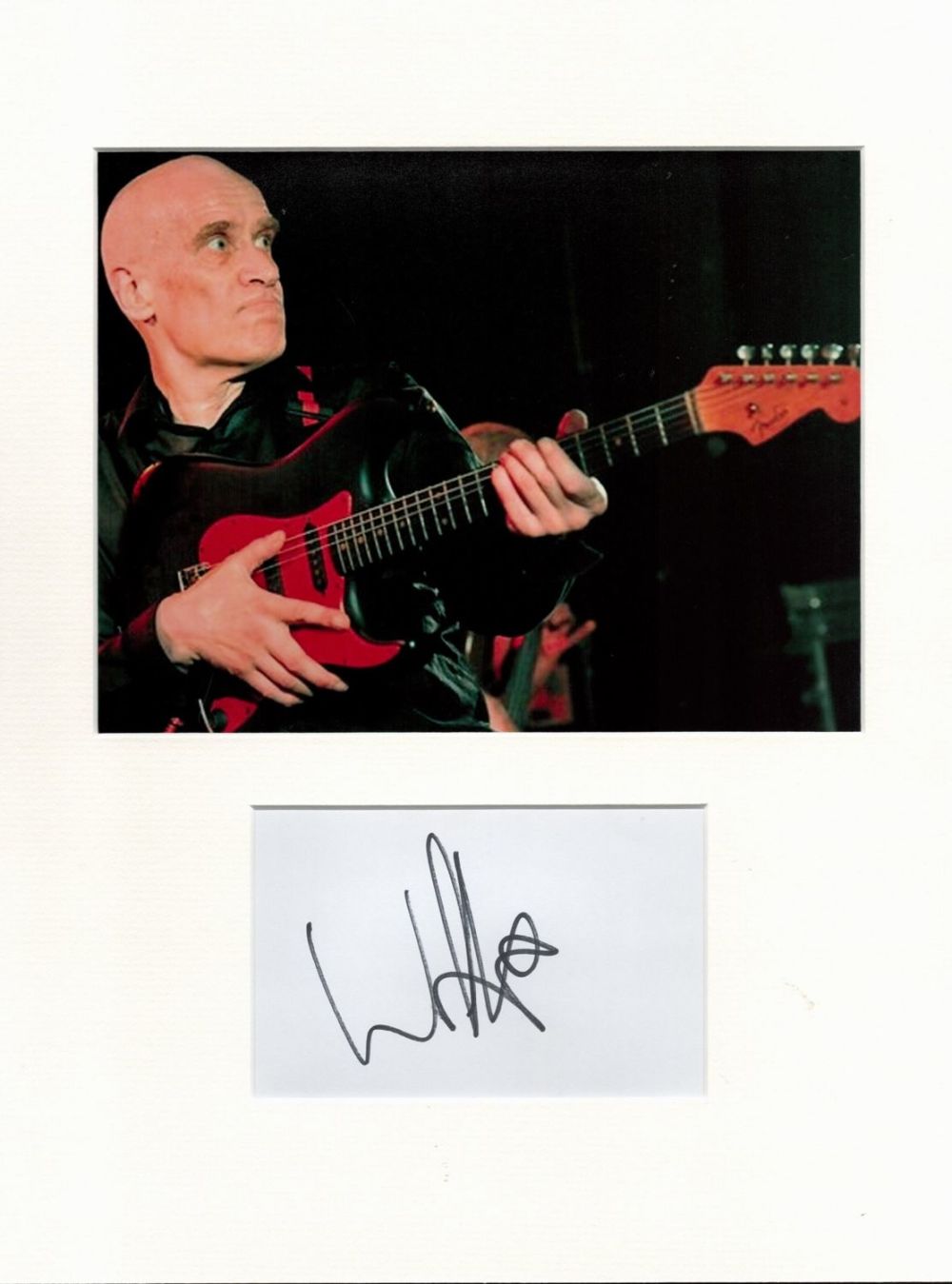 Lot 522: Wilko Johnson signature piece autograph presentation. Mounted with unsigned photo to approx. 16 x 12
