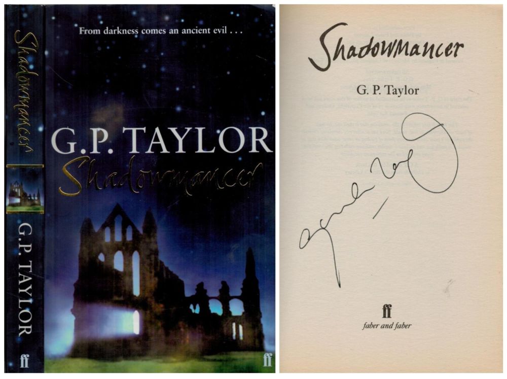 Lot 234: G. P. Taylor Signed Shadowmancer-From darkness comes an...
