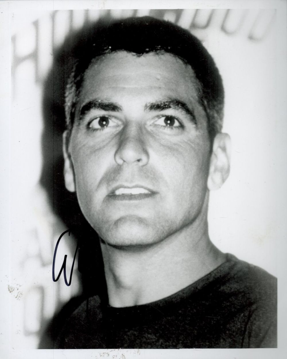 Lot 320: George Clooney signed 10x8 black and white photo....