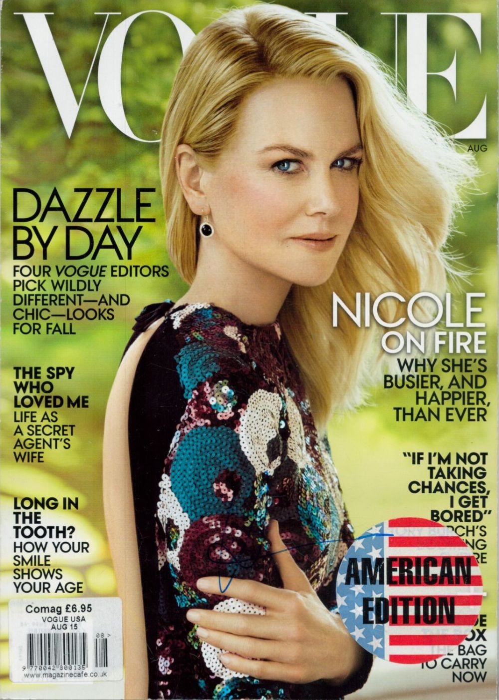 Lot 350: Nicole Kidman signed Vogue magazine. Good Condition. All...