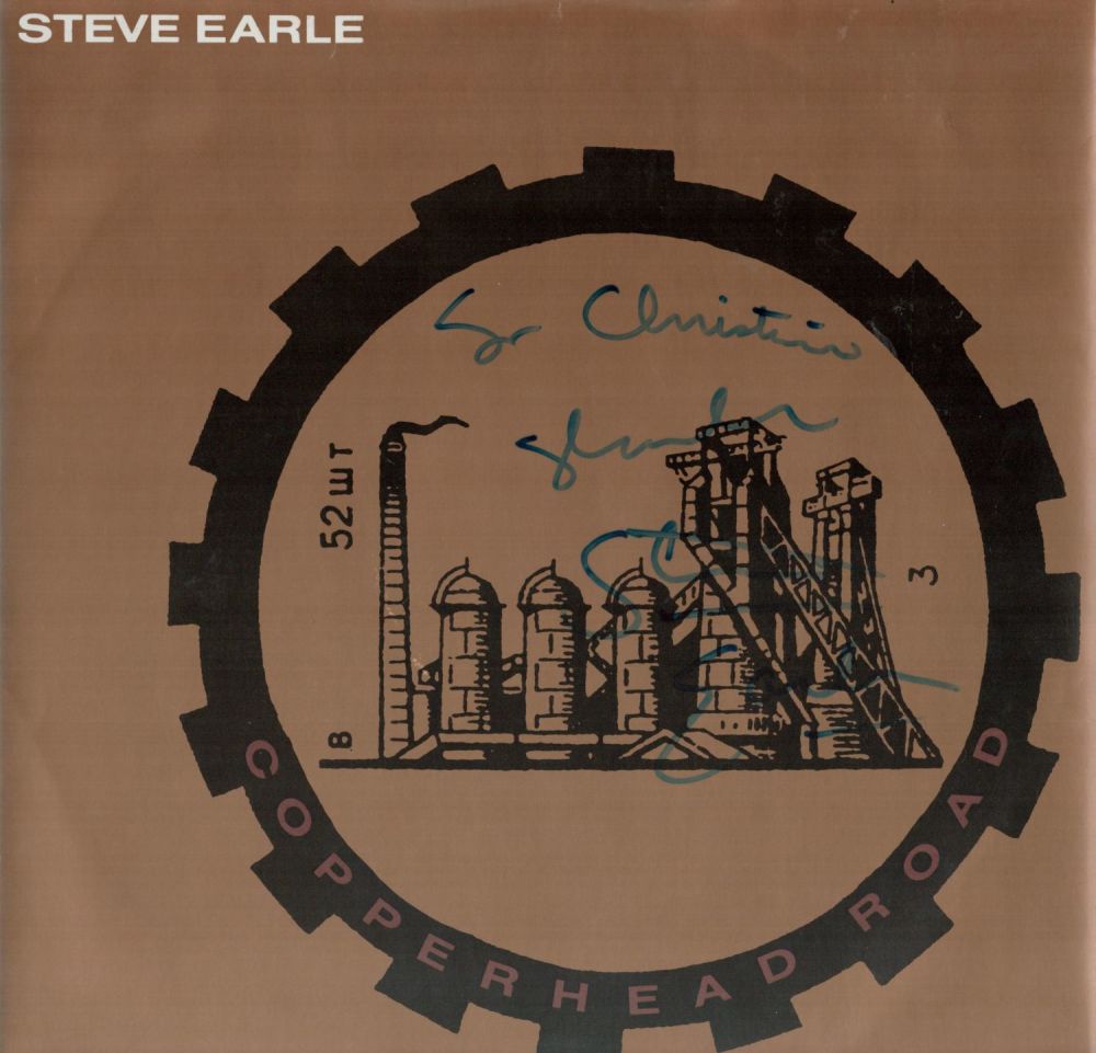 Lot 387: Steve Earle Copperhead Road signed and dedicated LP....