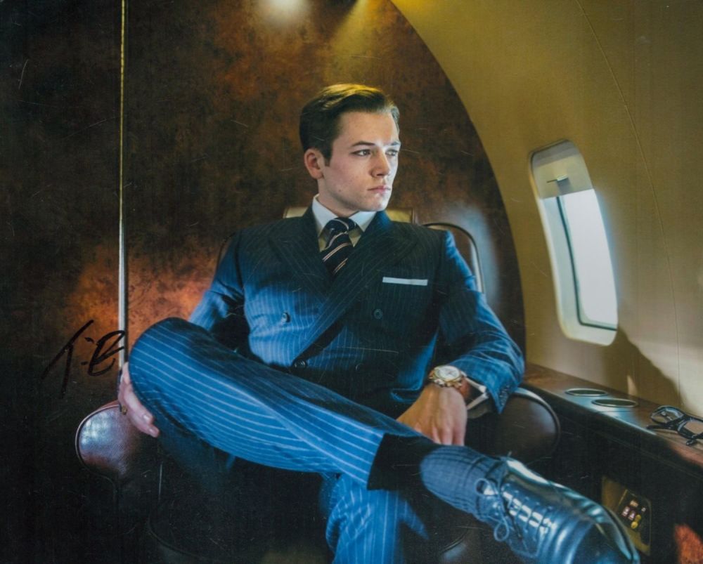 Lot 181: Taron Egerton signed Kingsman 10x8 inches colour photo....