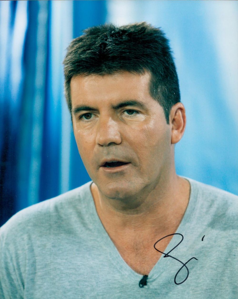 Lot 510: Simon Cowell signed 10x8 colour photo. Good condition....
