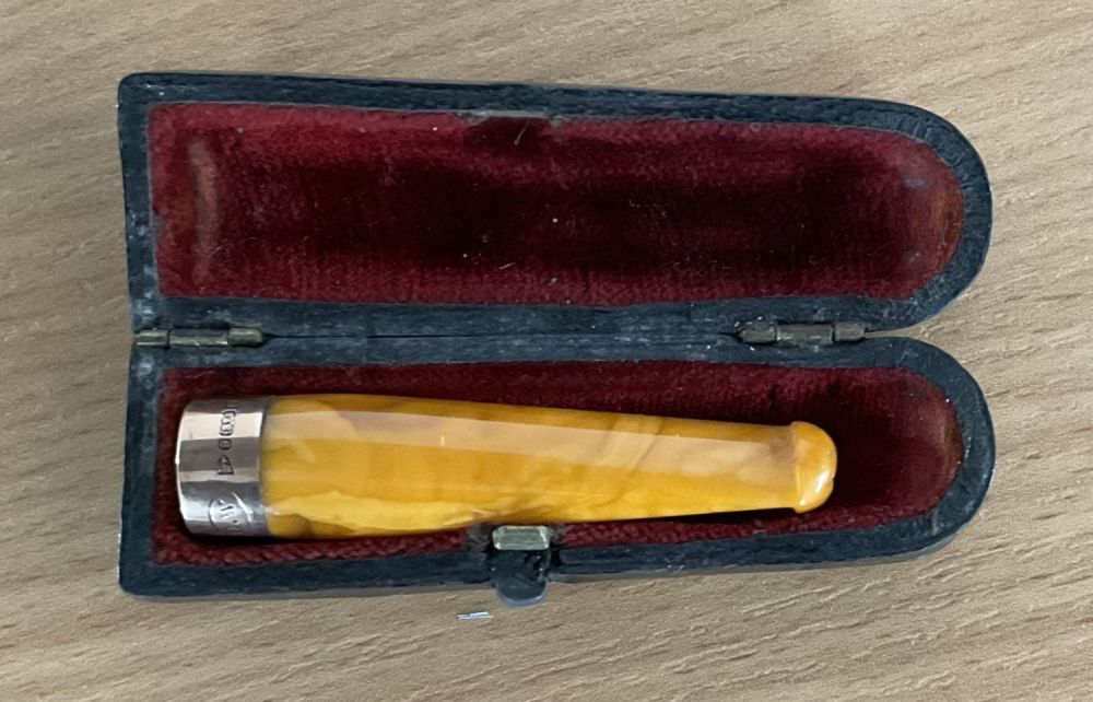 Lot 185: Collectables. Vintage Cigarette Holder. Hallmarked. Comes with original...