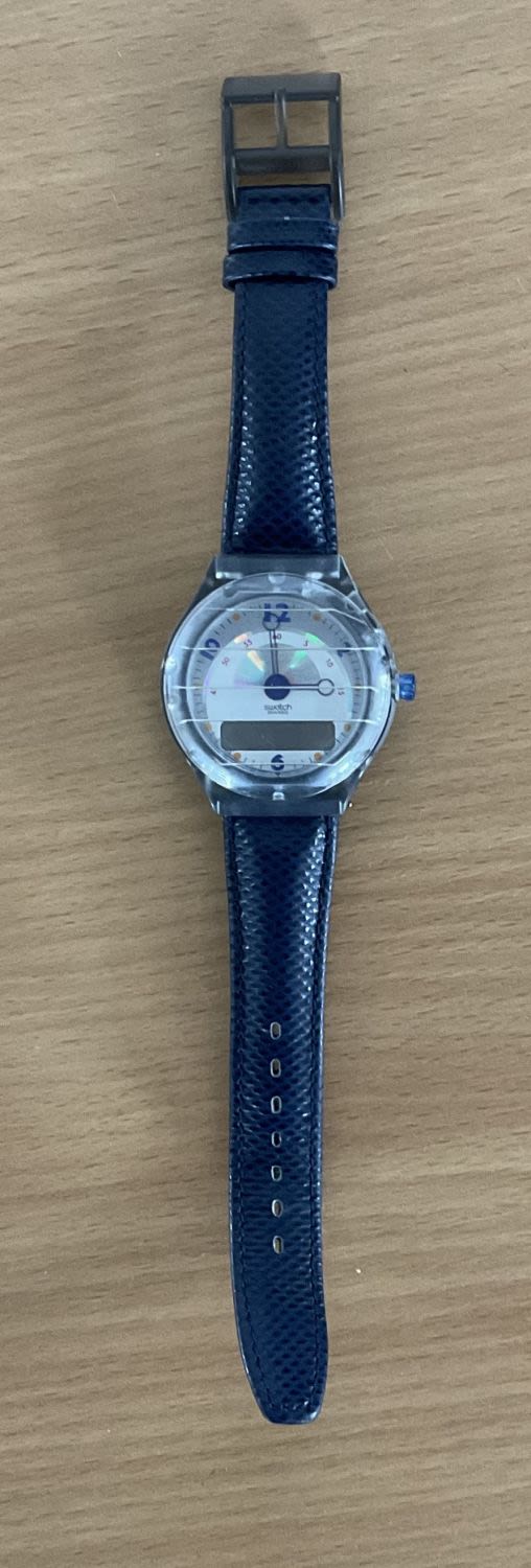 Lot 186: Collectables. 1993 Swiss Made Swatch Watch. Blue Straps....