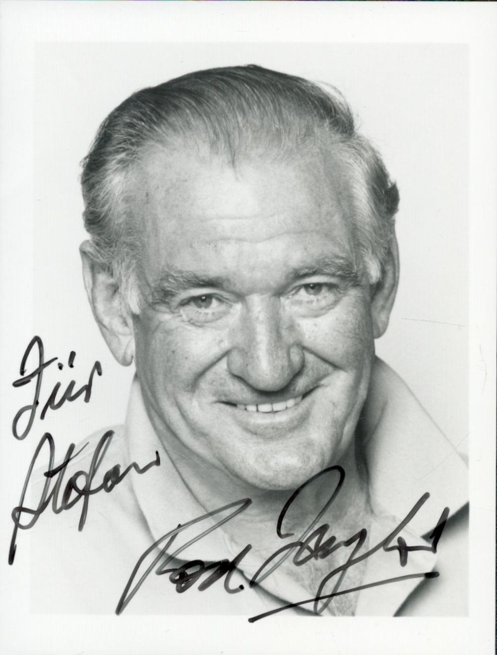 Lot 224: Rod Taylor signed 5x3inch black and white photo....
