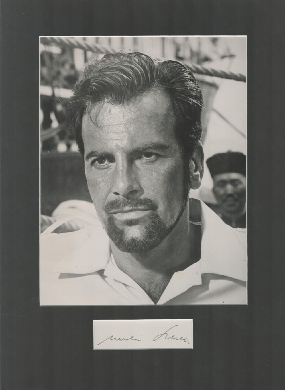 Lot 235: Maximillian Schell signature piece mounted below b/w photo....