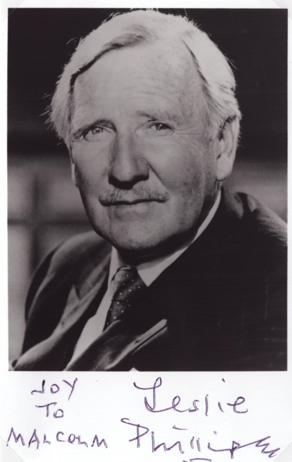 Lot 576: Leslie Phillips signed 6x4inch black and white photo....