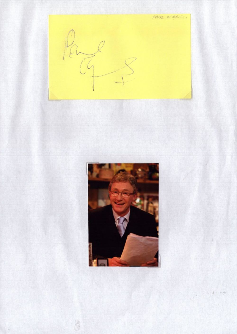 Lot 594: Paul O'Grady signed 5x3inch album page. Good condition....