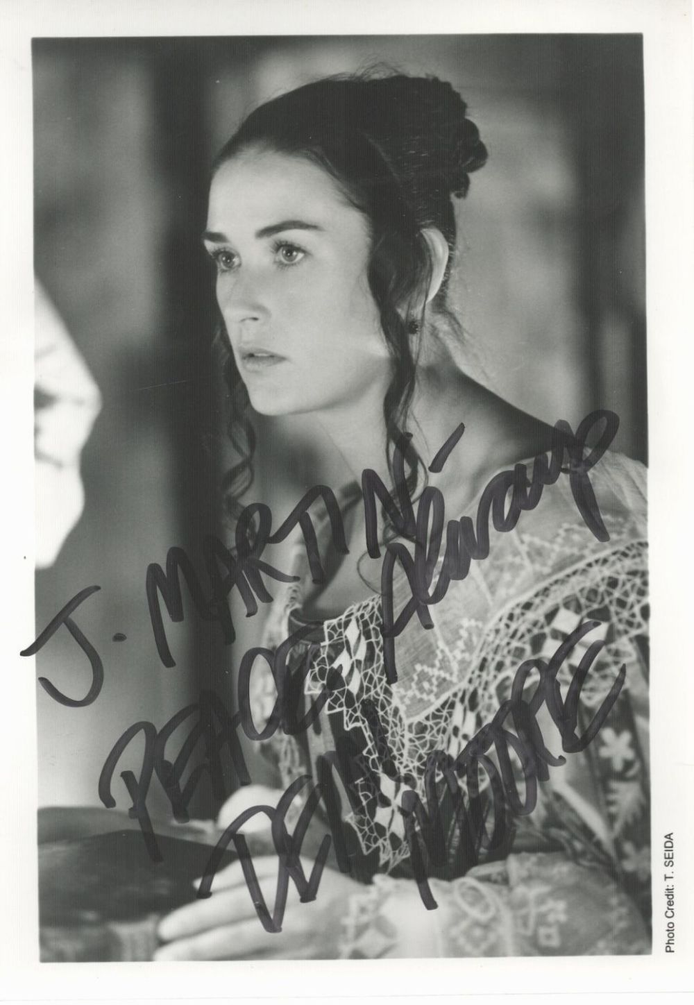 Lot 107: Demi Moore, a signed and dedicated 7x5 photo....