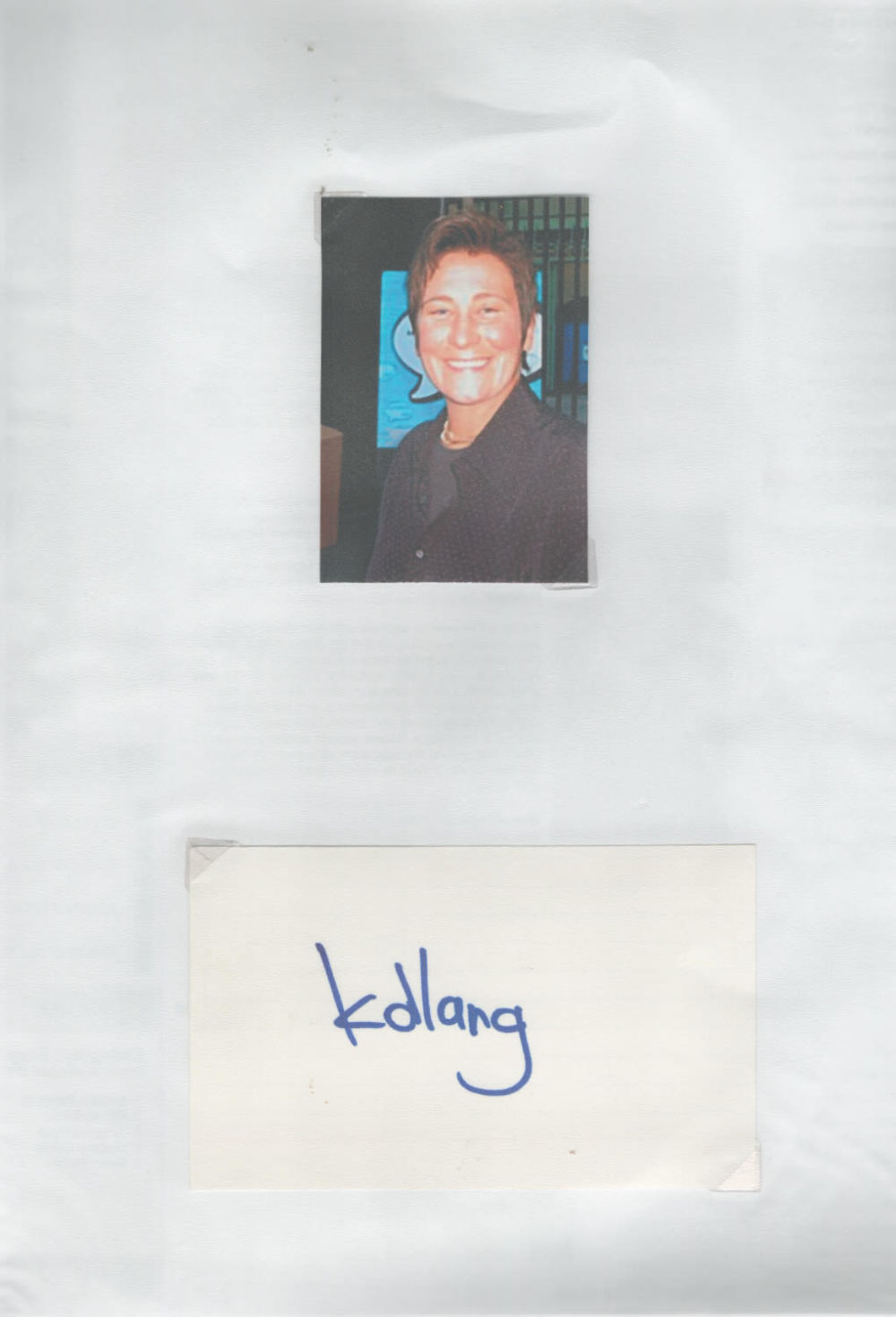 Lot 214: K D Lang signed 6x2inch album page. Good...