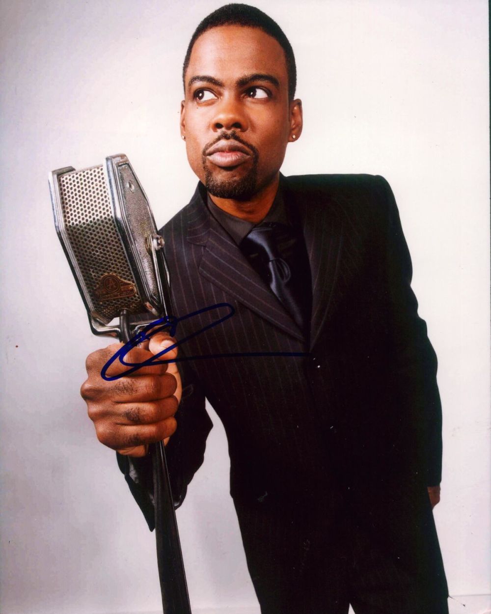 Lot 329: Chris Rock signed 10x8 inch colour photo. Good...