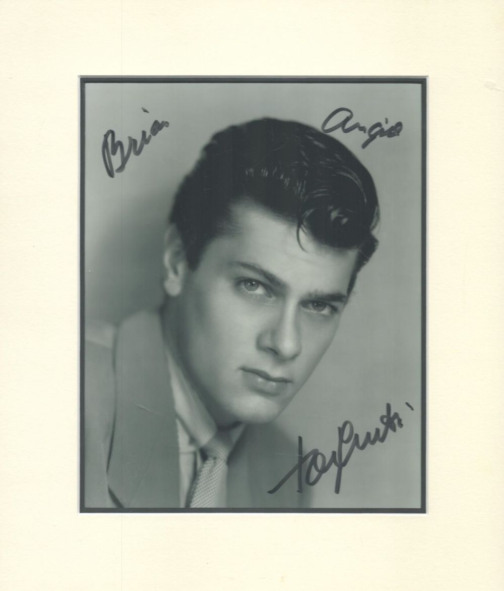 Lot 696: Tony Cutis signed 14x12 inch black and white...