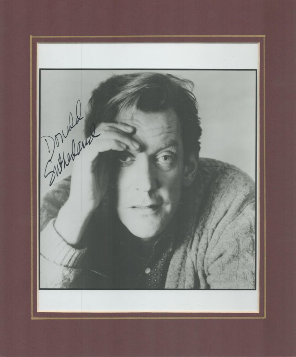 Lot 699: Donald Sutherland signed 12x10 inch overall mounted black...