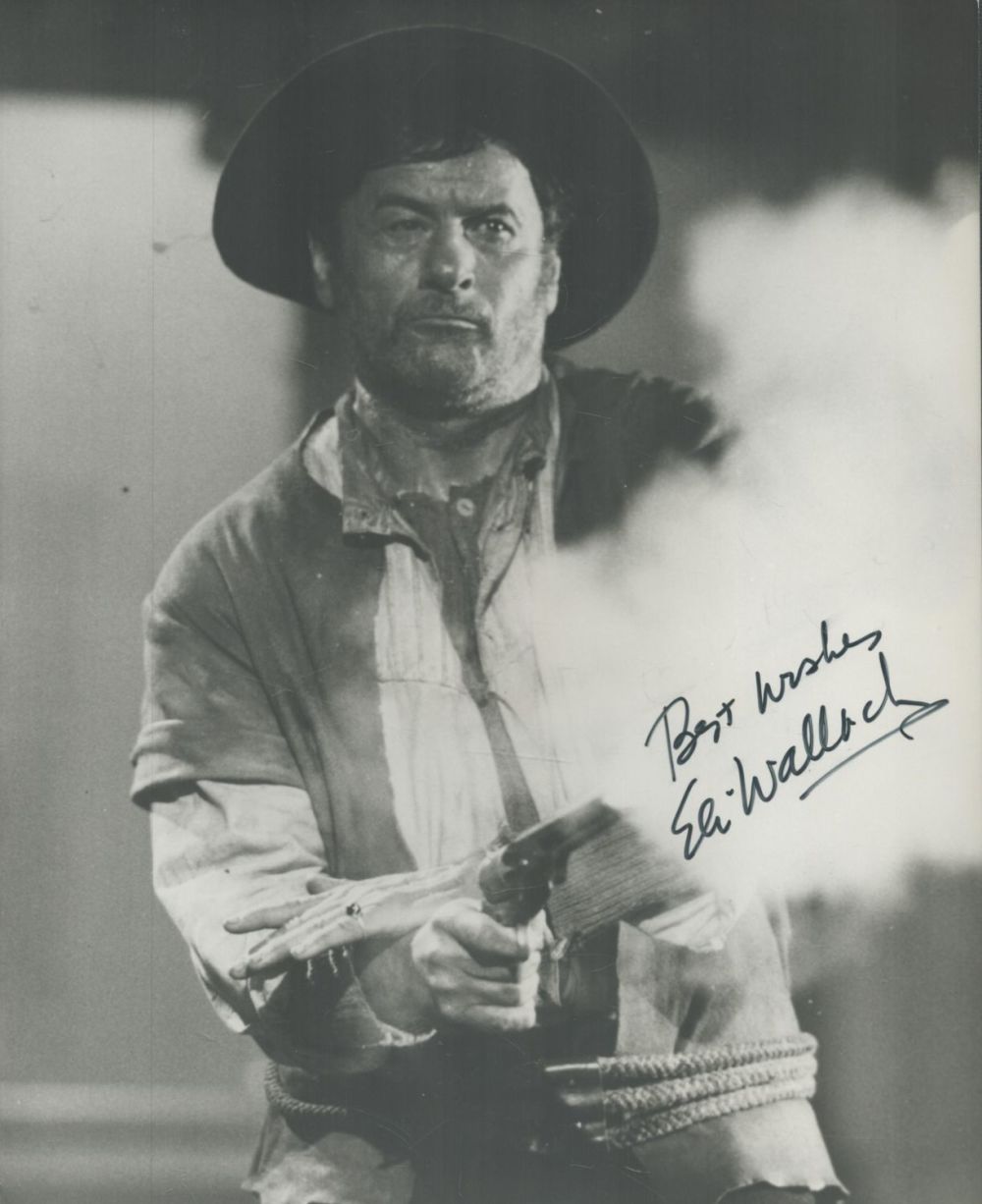 Lot 717: Eli Wallach signed 10x8 inch black and white...
