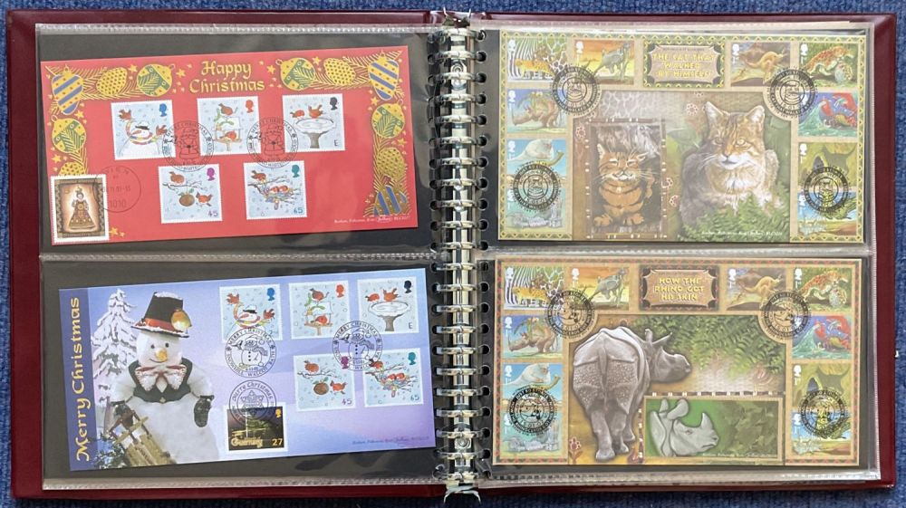 Lot 273: Burgundy Benham Album collection 15 FDC 9 HM...