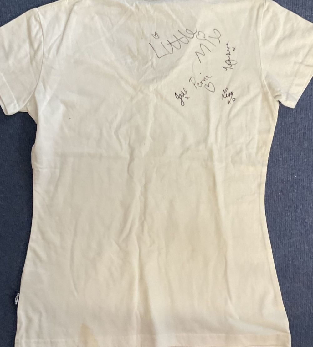 Lot 656: Little Mix multi signed Triumph Motorcycles T shirt...