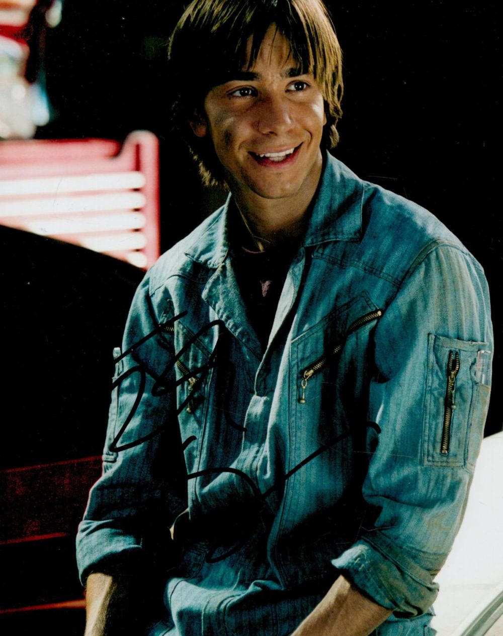 Lot 106: Justin Long signed 10x8 inch colour photo. Good...