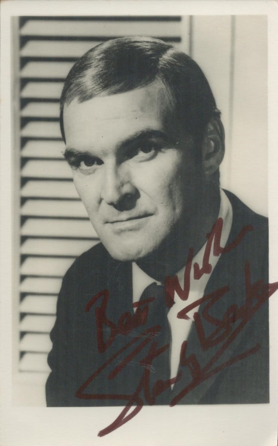 Lot 76: Stanley Baker signed early black and white photo....