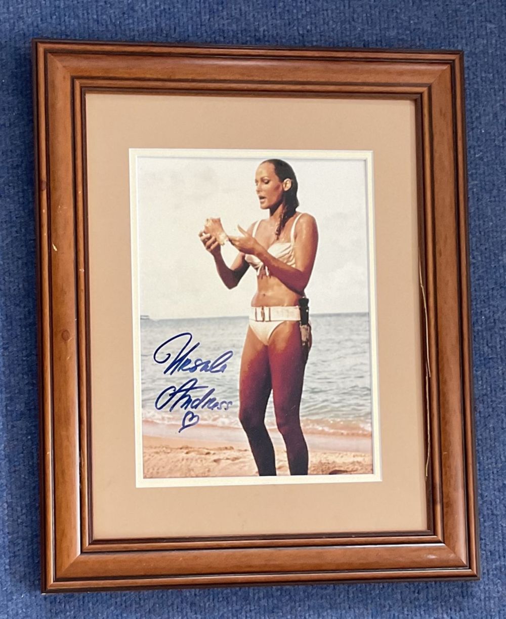 Lot 99: Ursula Andress signed 16x13 overall framed and mounted...