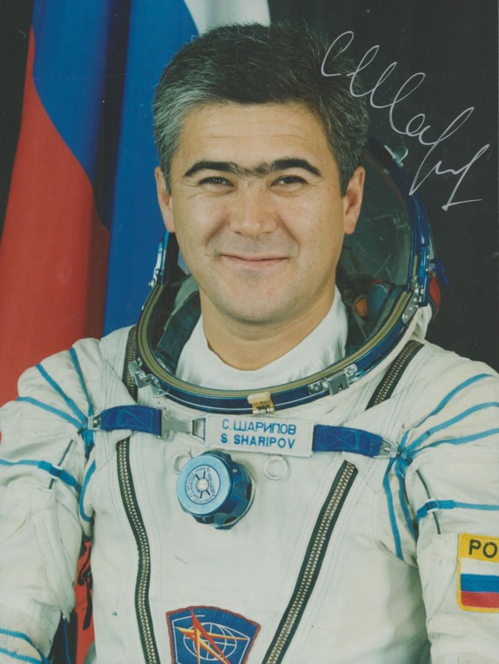 Lot 145: Cosmonaut Salizhan Sharipov signed colour portrait photo 8...