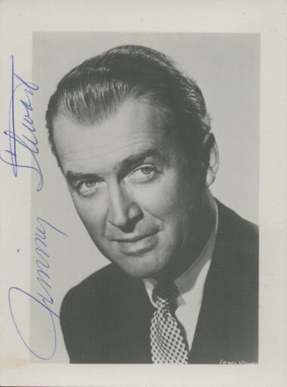 Lot 229: JAMES STEWART signed 4x3inch black and white photo....