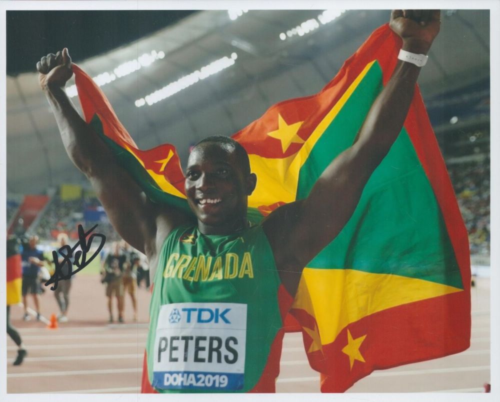 Lot 185: Athletics Anderson Peters signed 10x8 inch colour photo....