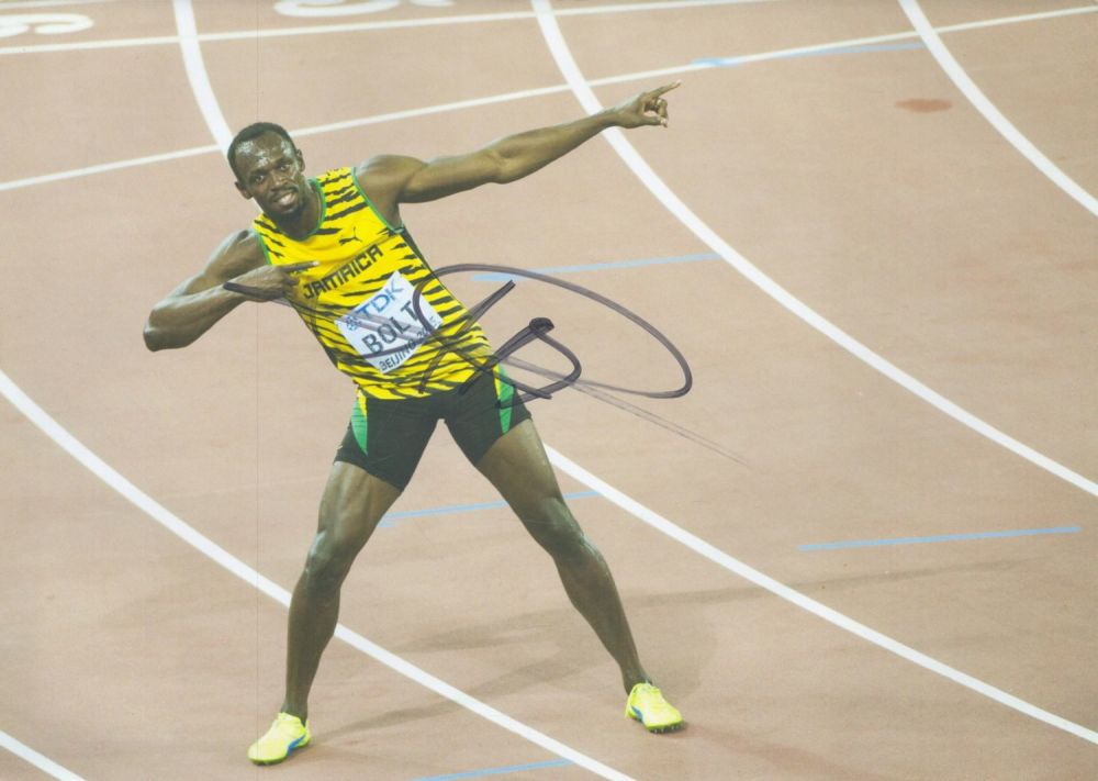 Lot 257: Athletics Usain Bolt signed 12x8 inch colour photo....