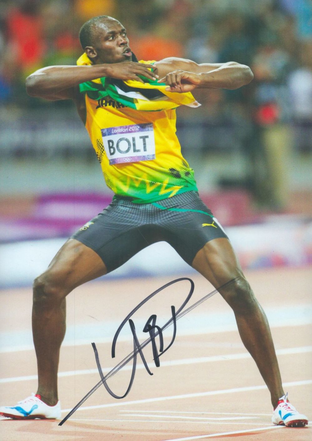 Lot 258: Athletics Usain Bolt signed 12x8 inch colour photo....