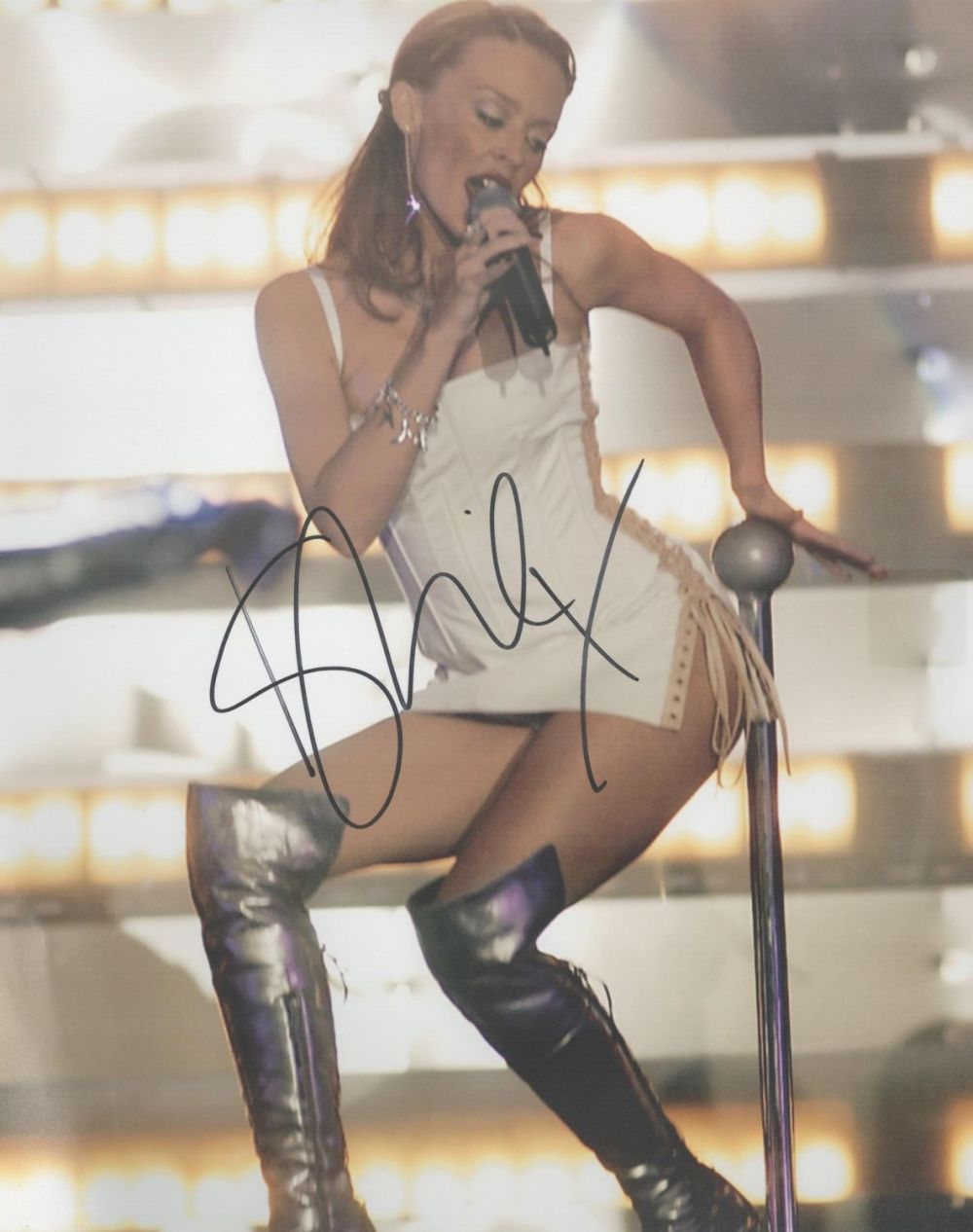 Lot 51: Kylie Minogue signed 10x8 inch colour photo. Good...