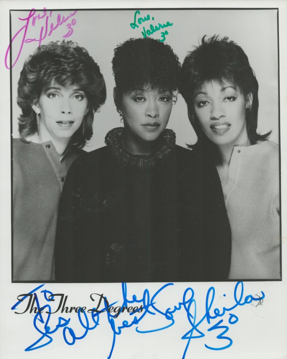 Lot 133: The Three Degrees multi signed 10x8 inch black...