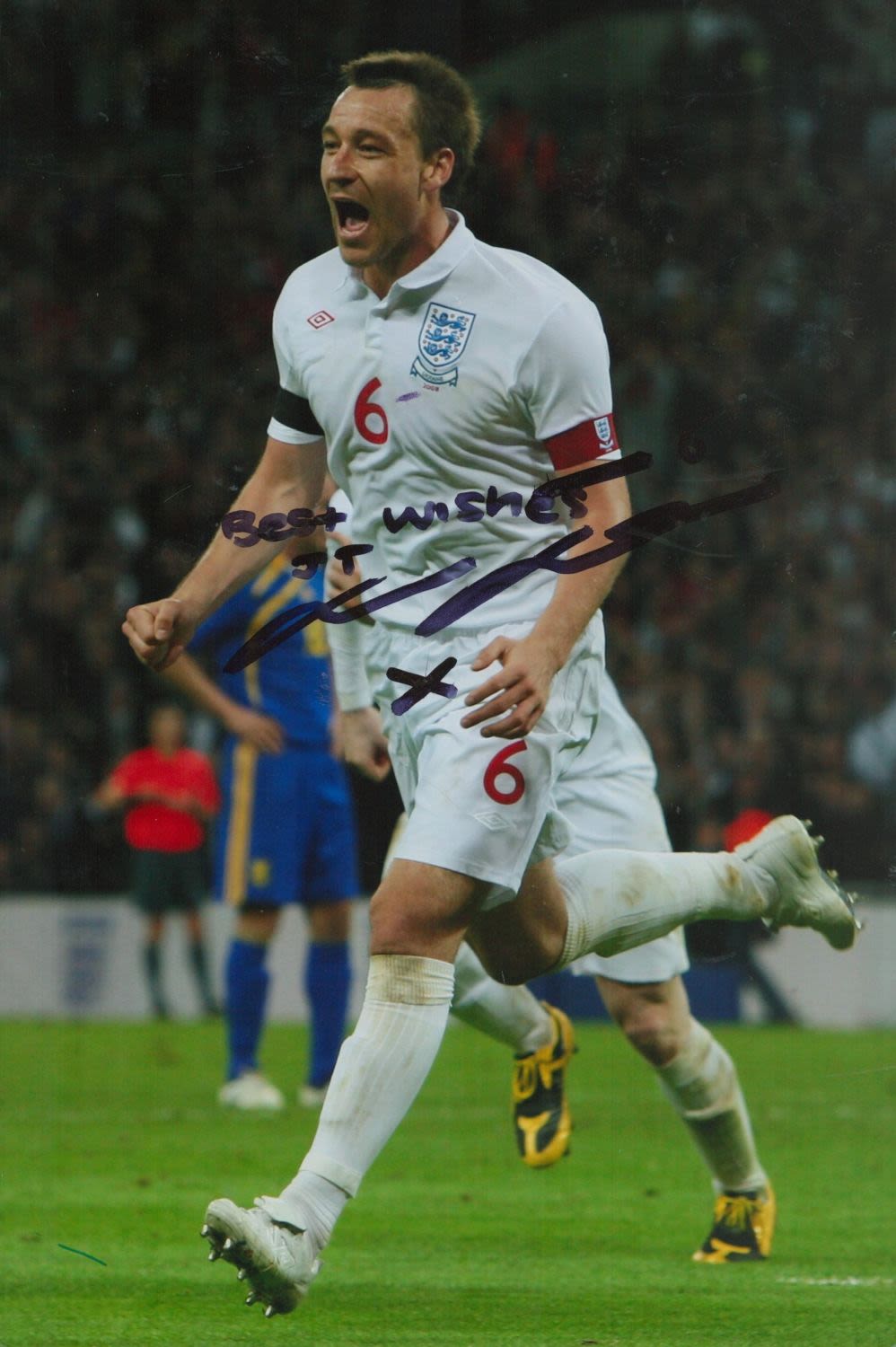 Lot 411: John Terry signed 12x8 inch colour photo pictured...