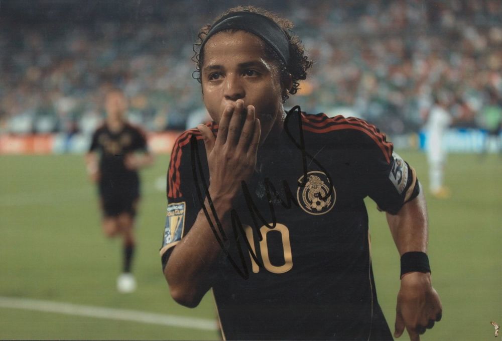 Lot 426: Giovani Dos Santos signed 12x8 inch colour photo...