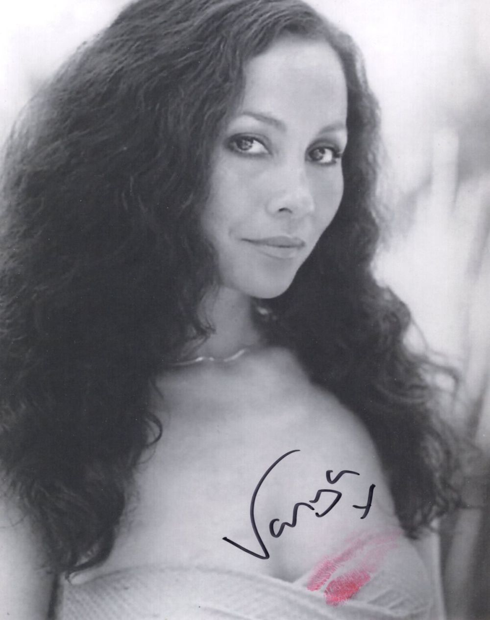Lot 597: 007 James Bond actress and Page 3 topless...